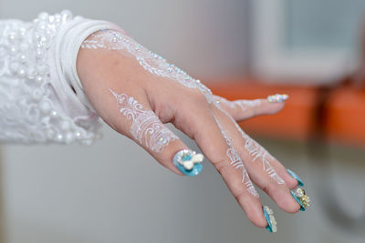 Close-up of woman hand with nail art