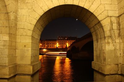 Illuminated bridge over water