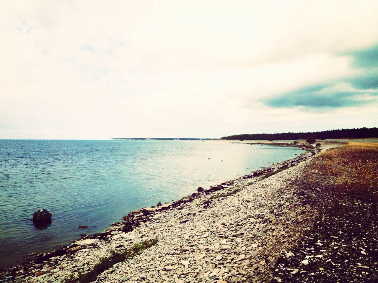 sea, water, horizon over water, beach, tranquil scene, scenics, tranquility, sky, shore, beauty in nature, nature, sand, idyllic, coastline, cloud - sky, calm, outdoors, remote, non-urban scene, seascape