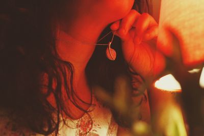 Close-up of woman wearing necklace