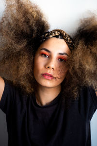 Close-up portrait of a serious young woman