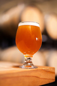 Close-up of beer glass on table