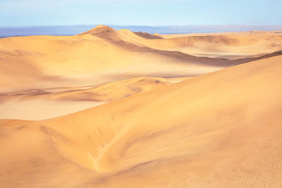 Scenic view of desert against sky