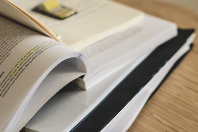 High angle view of open book on table