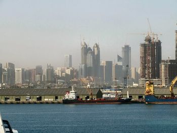 View of buildings in city at waterfront