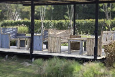 Built structure on field against trees