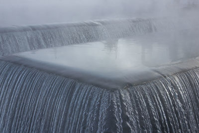 Overflow of water on the technological channel of the hydroelectric power station
