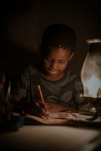 Portrait of boy playing piano