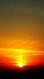 Scenic view of dramatic sky during sunset