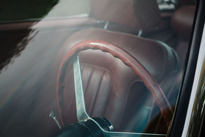 Close-up of steering wheel in vintage car