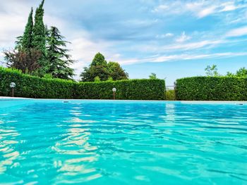 Scenic view of swimming pool against sky