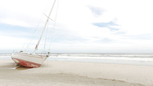Boat in sea against sky