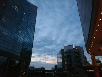 Low angle view of modern building against sky