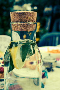 Close-up of beer bottle on table