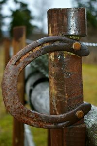 Close-up of rusty metal fence