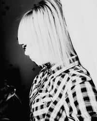 Rear view of woman against white background