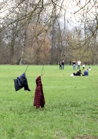 Group of people walking on field