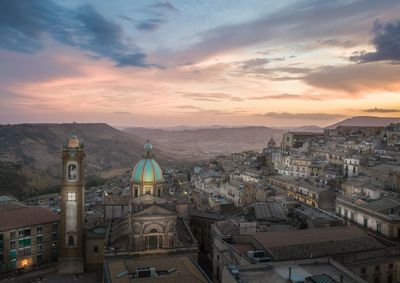 High angle view of townscape against sky during sunset
