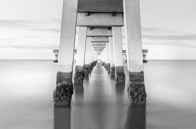 Scenic view of pier over sea against sky