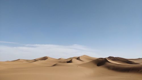 Scenic view of desert against sky