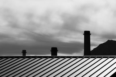 Low angle view of factory against sky