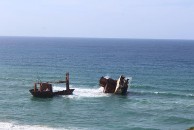 Scenic view of sea against clear sky