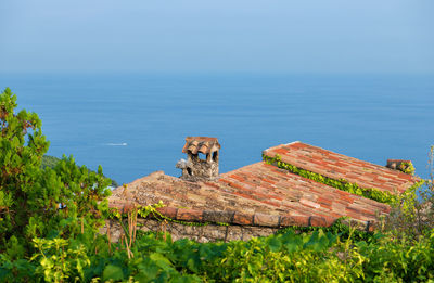 Scenic view of sea against blue sky