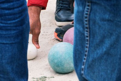 Close-up of hands holding ball