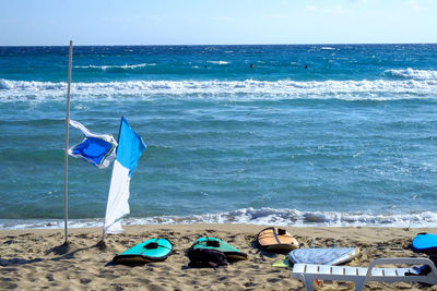 Surfboards on shore at beach