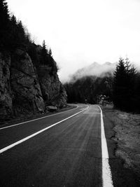 Road on mountain against sky
