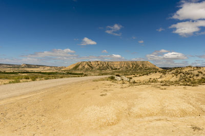 Scenic view of desert against sky