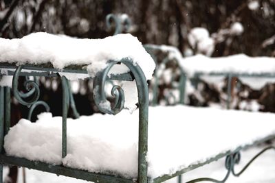 Close-up of icicles against snow