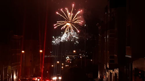 Firework display at night