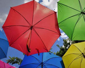 Low angle view of umbrella against sky