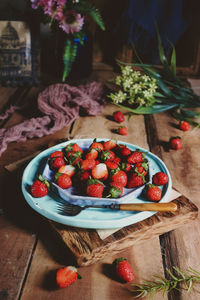 High angle view of fruits in basket on table