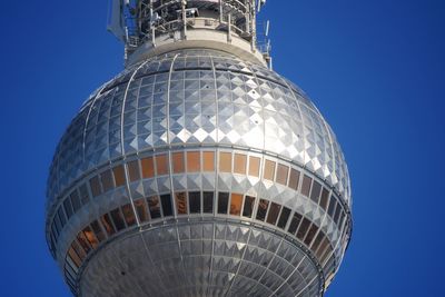 Low angle view of building against blue sky