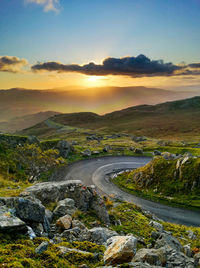 Scenic view of landscape against sky during sunset