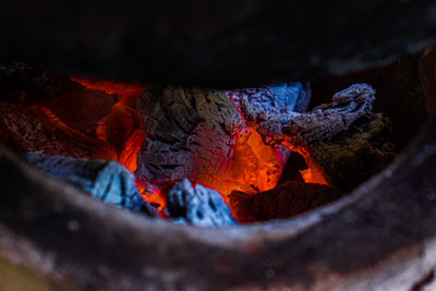 High angle view of fire on wood