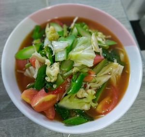 High angle view of salad in bowl on table