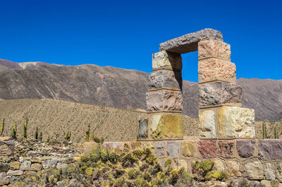 Stone arch doorway at pucara de tilcara