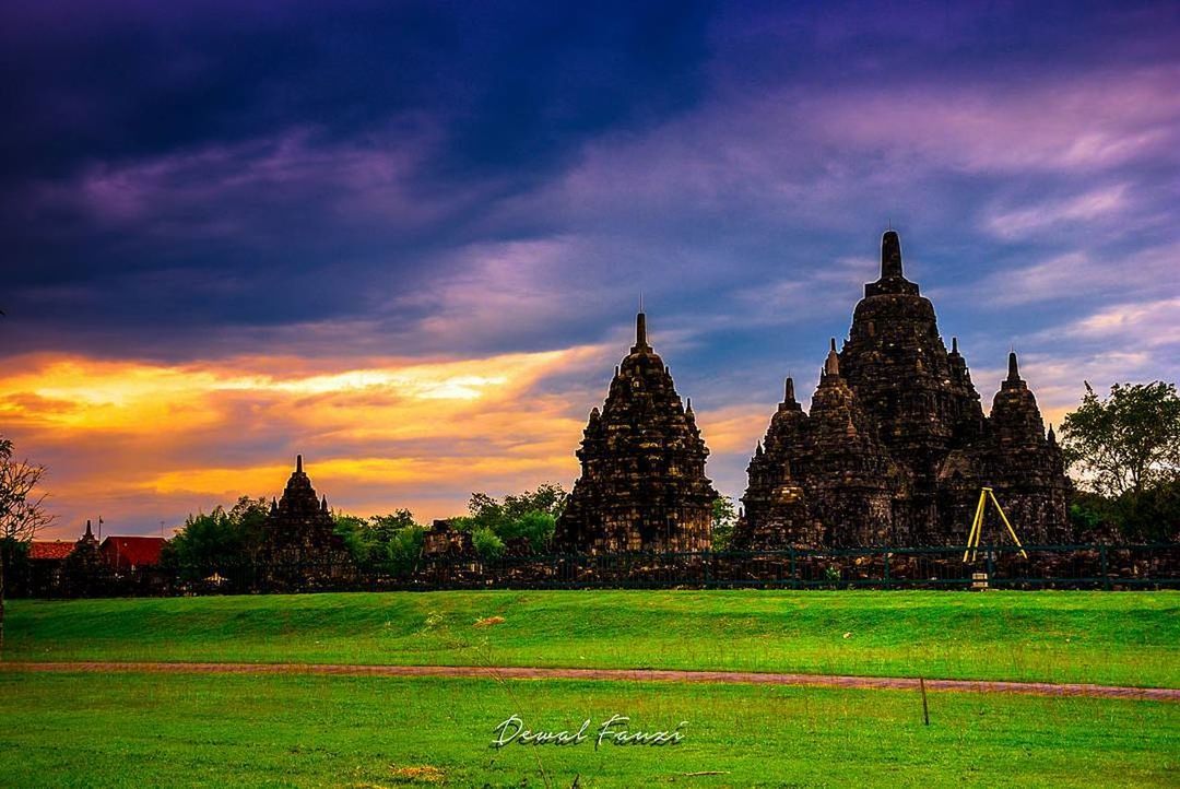 TEMPLE AGAINST CLOUDY SKY