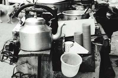 Tea kettle and cups at stall