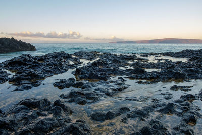 Scenic view of sea against sky during sunset