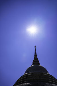 Low angle view of building against blue sky