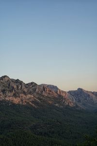 Scenic view of mountains against clear sky