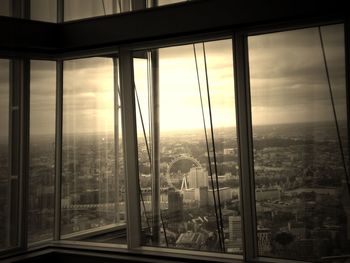 View of cityscape through window