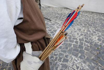 Close-up of man working on paper