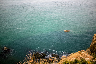 High angle view of sea seen from cliff