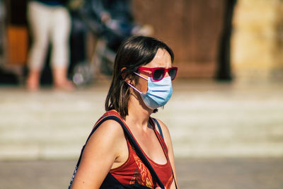 Portrait of woman wearing sunglasses