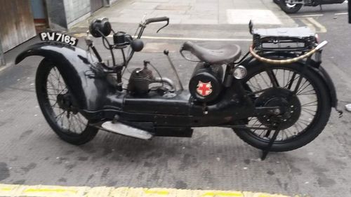 Close-up of motorcycle on road